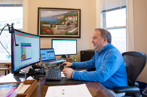 Gary at desk from side 3