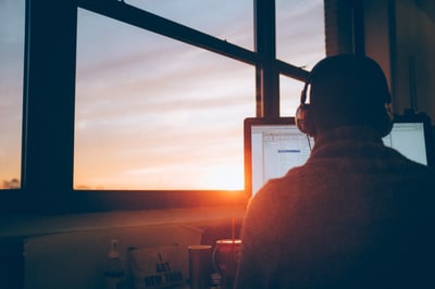 Man Watching Webinar on Desktop