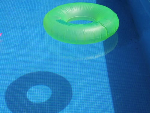 pool green float - photo by Ben Vloon - Unsplash