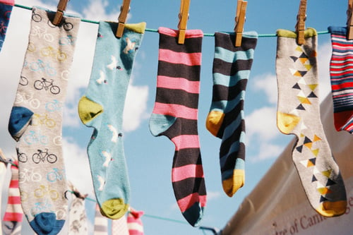 socks on a clothes line - image by Nick Page - unsplash